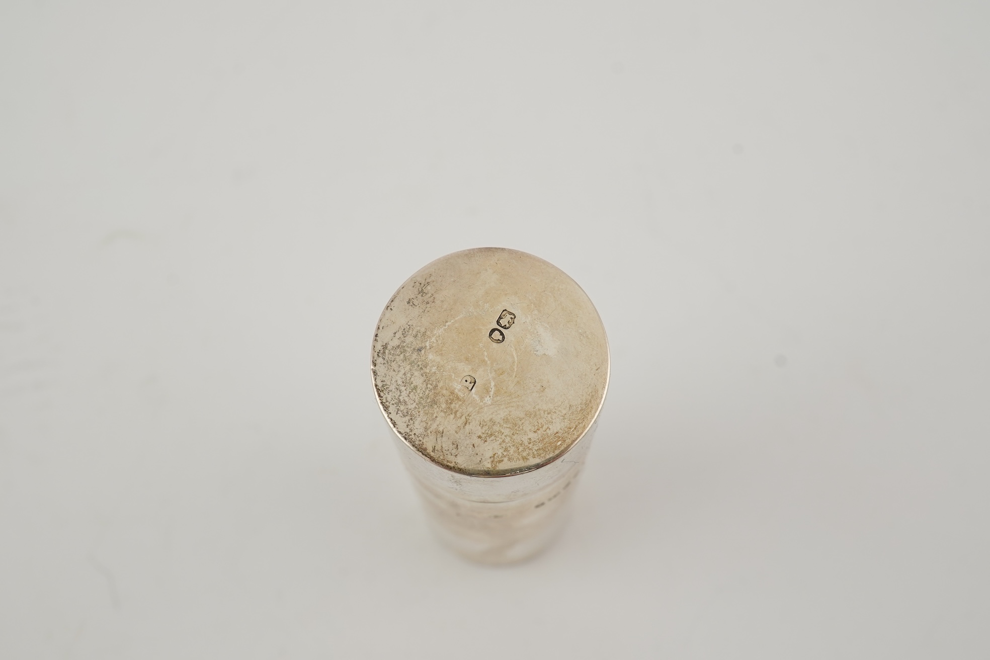 A late Victorian parcel gilt silver tubular coin holder, by Frederic Purnell